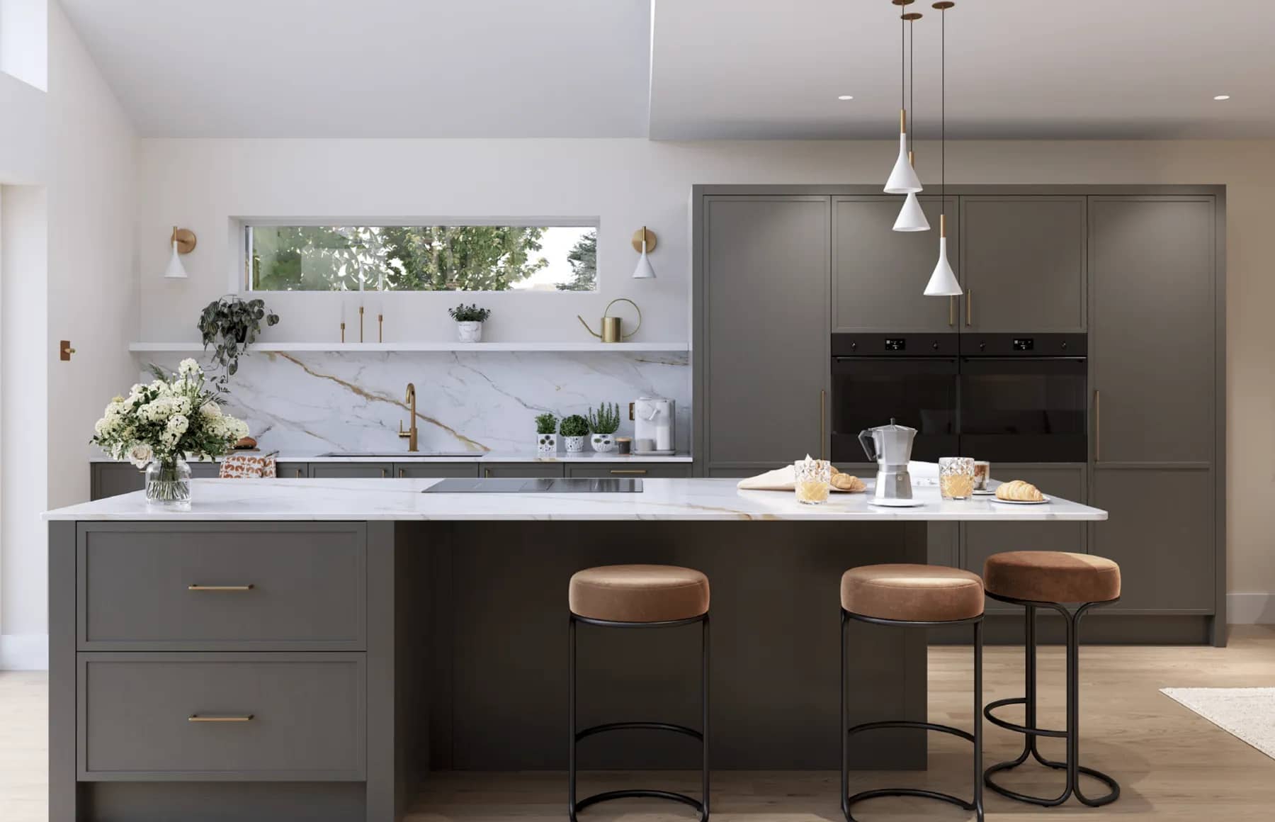 Graphite kitchen with a marble-topped island, tan leather stools and integrated double ovens.