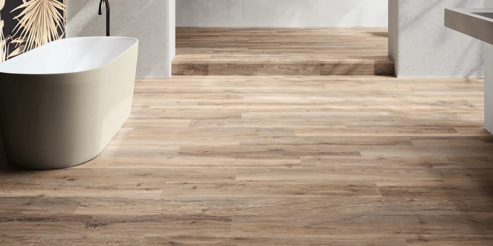 A wood-look plank floor photographed close, the joints between planks running across the frame